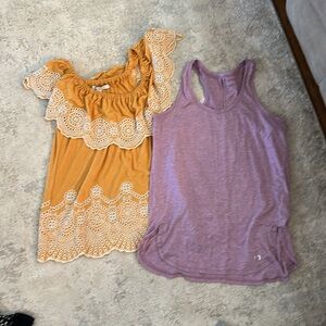 2 womens shirts size medium